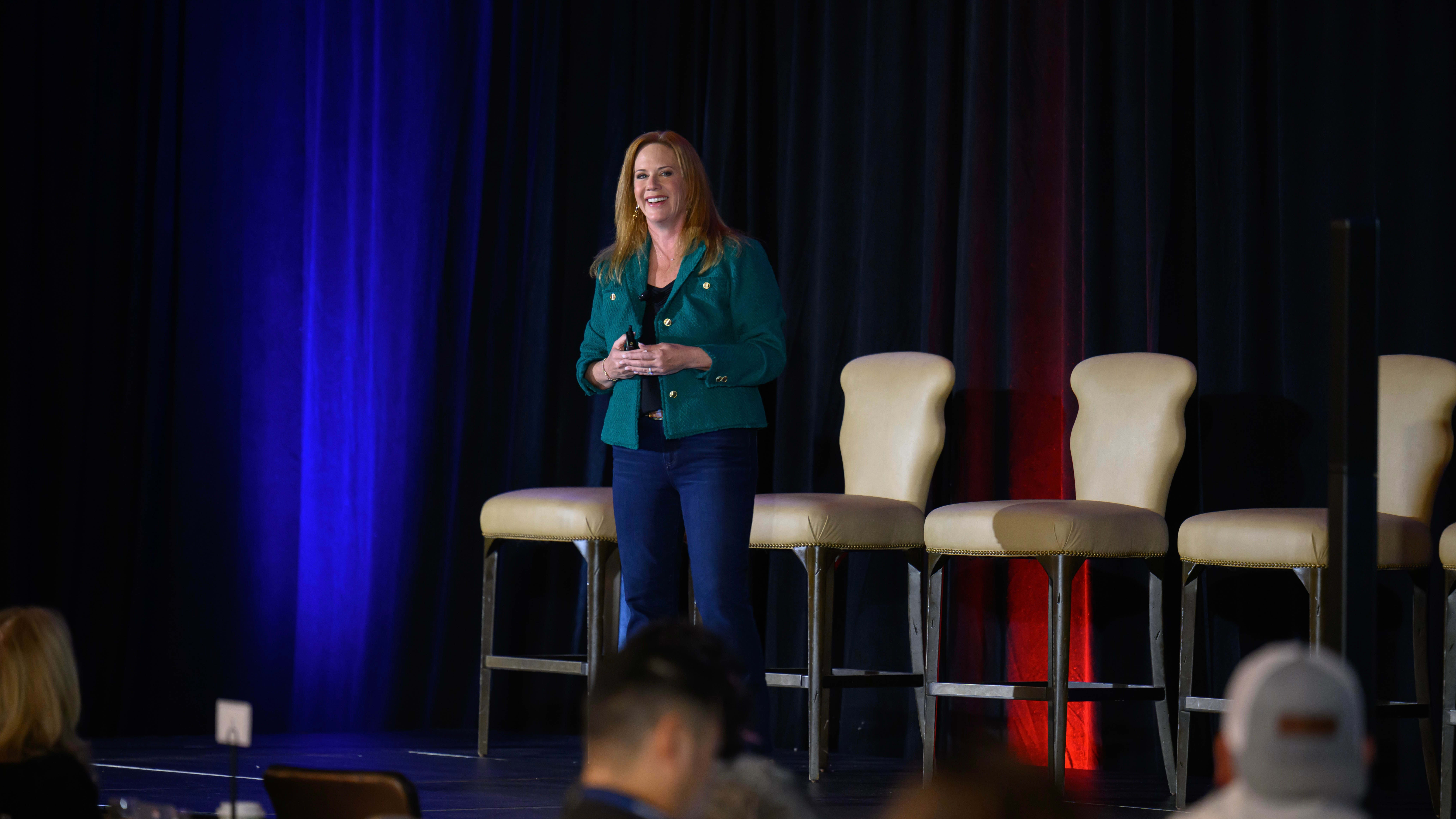 Amy onstage at the 2024 Elite Retreat Amy onstage at the 2024 Elite Retreat