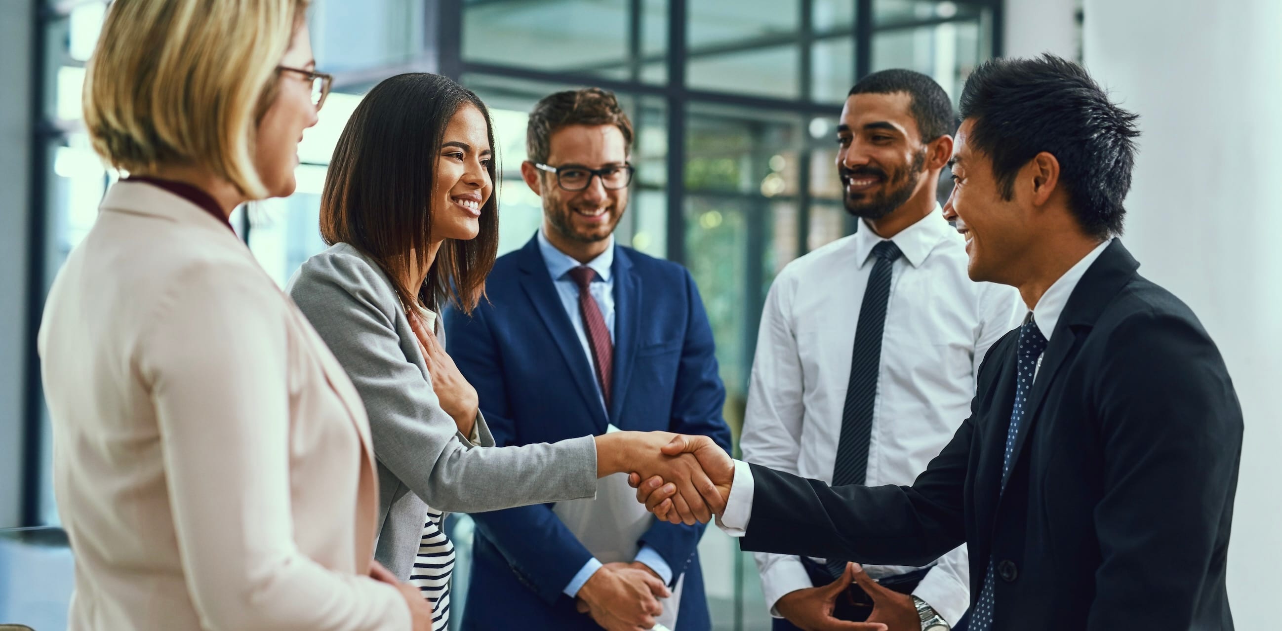 Business people meet one another