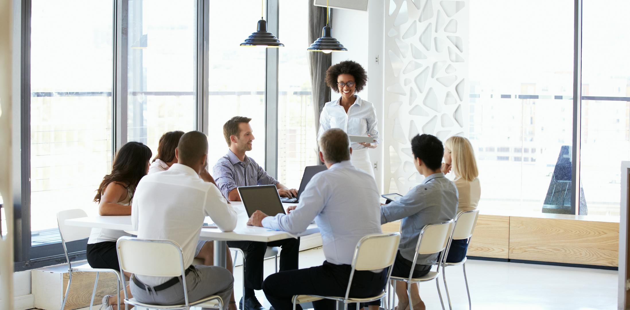Office meeting with big windows in the background