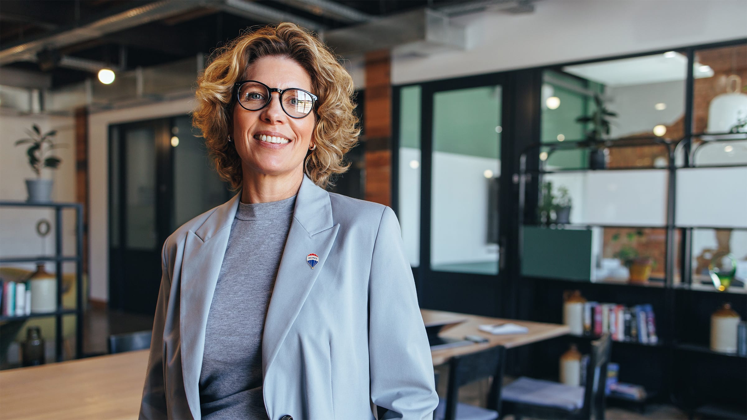 woman with remax pin