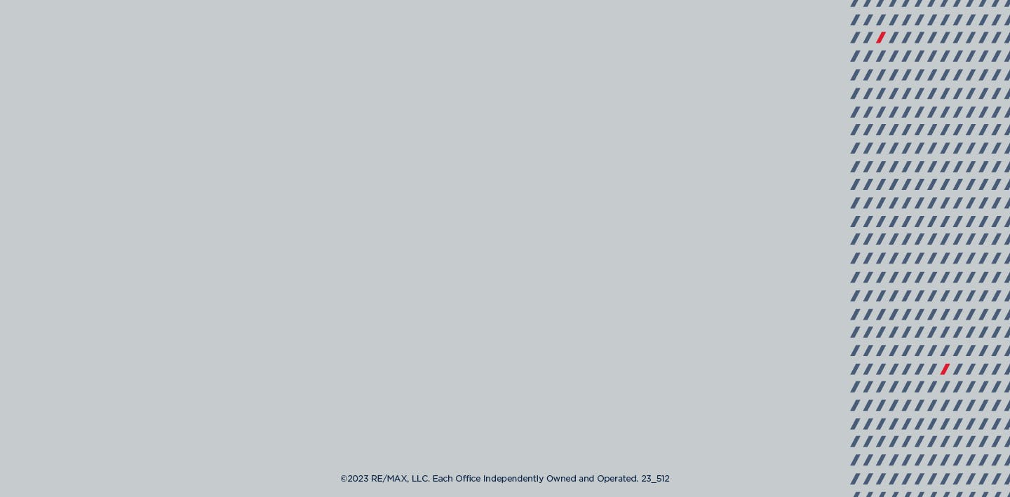 Grey background with blue and red patterns on the right side.