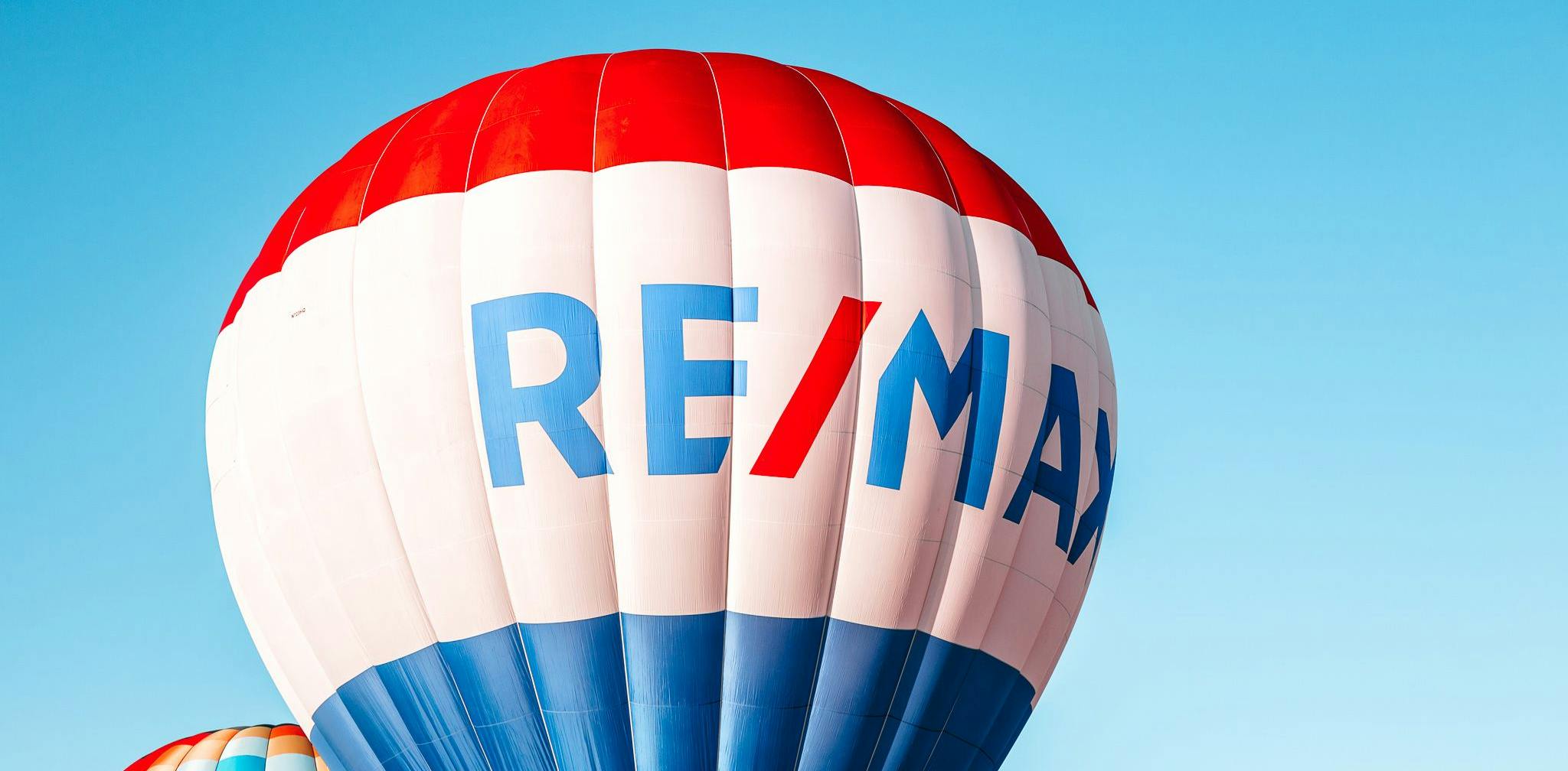 The RE/MAX balloon flying for the Lifting the World Up global event. Photo credit: Missy Miller.