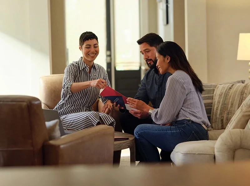 three people talking