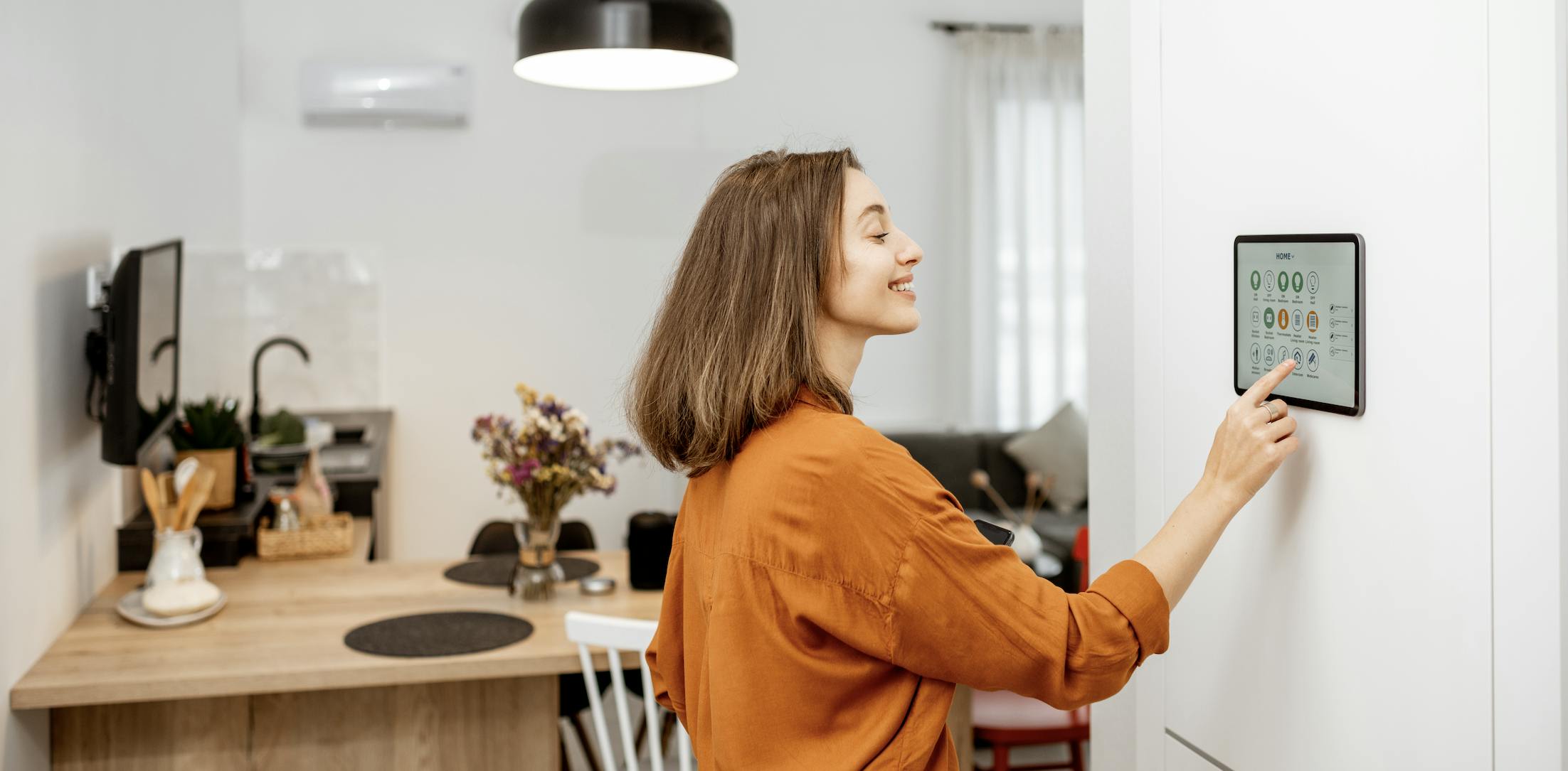Woman using smart home technology