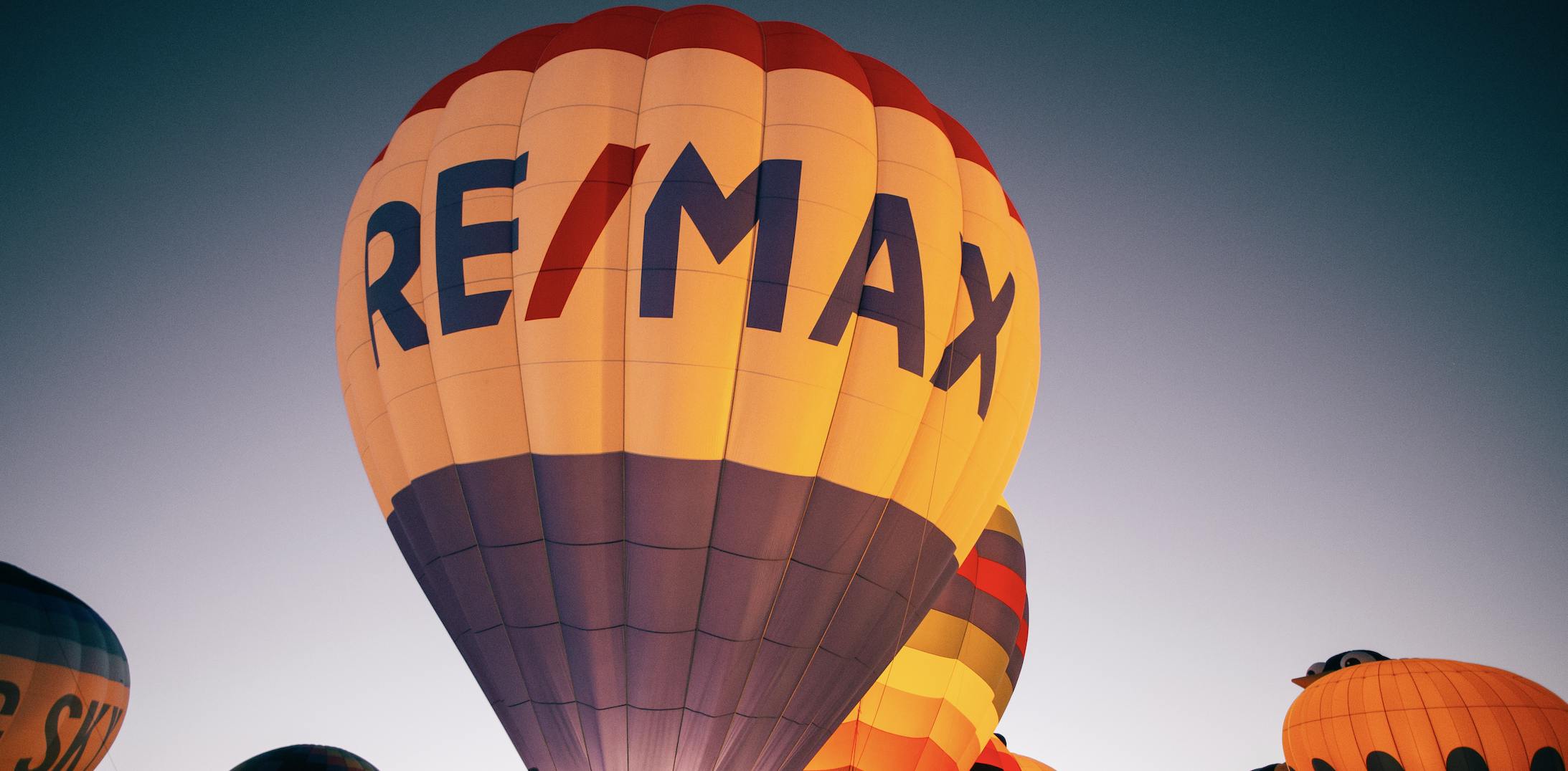 RE/MAX balloon at nighttime. Photo by Missy Miller
