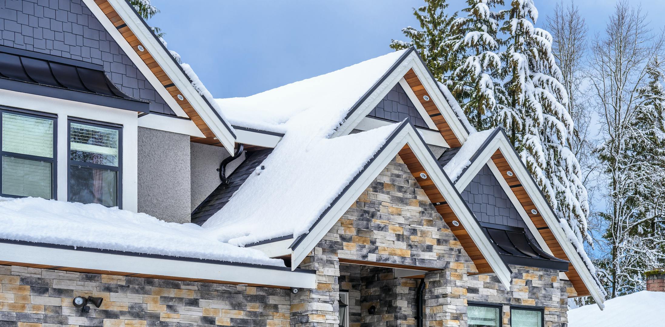 Snow on the roof of a house.
