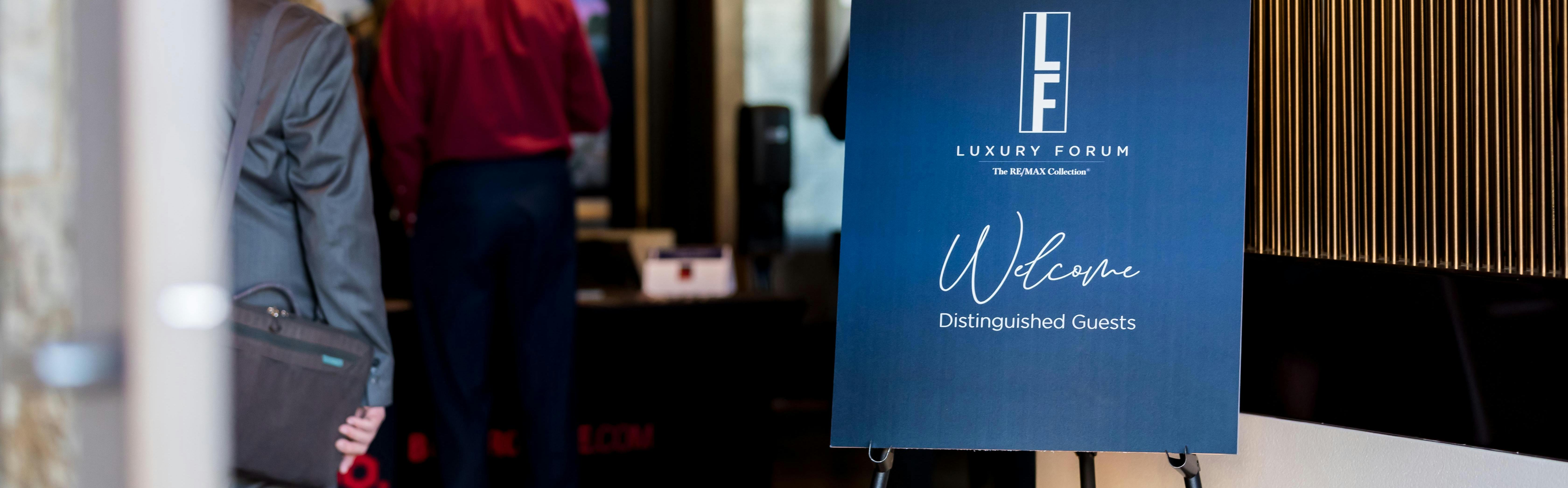 Luxury Forum sign welcomes distinguished guests of The RE/MAX Collection event.