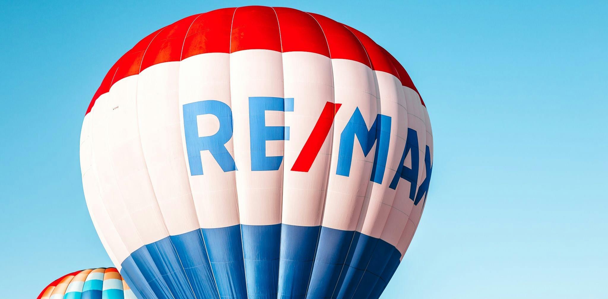 The RE/MAX balloon flying for the Lifting the World Up global event. Photo credit: Missy Miller.