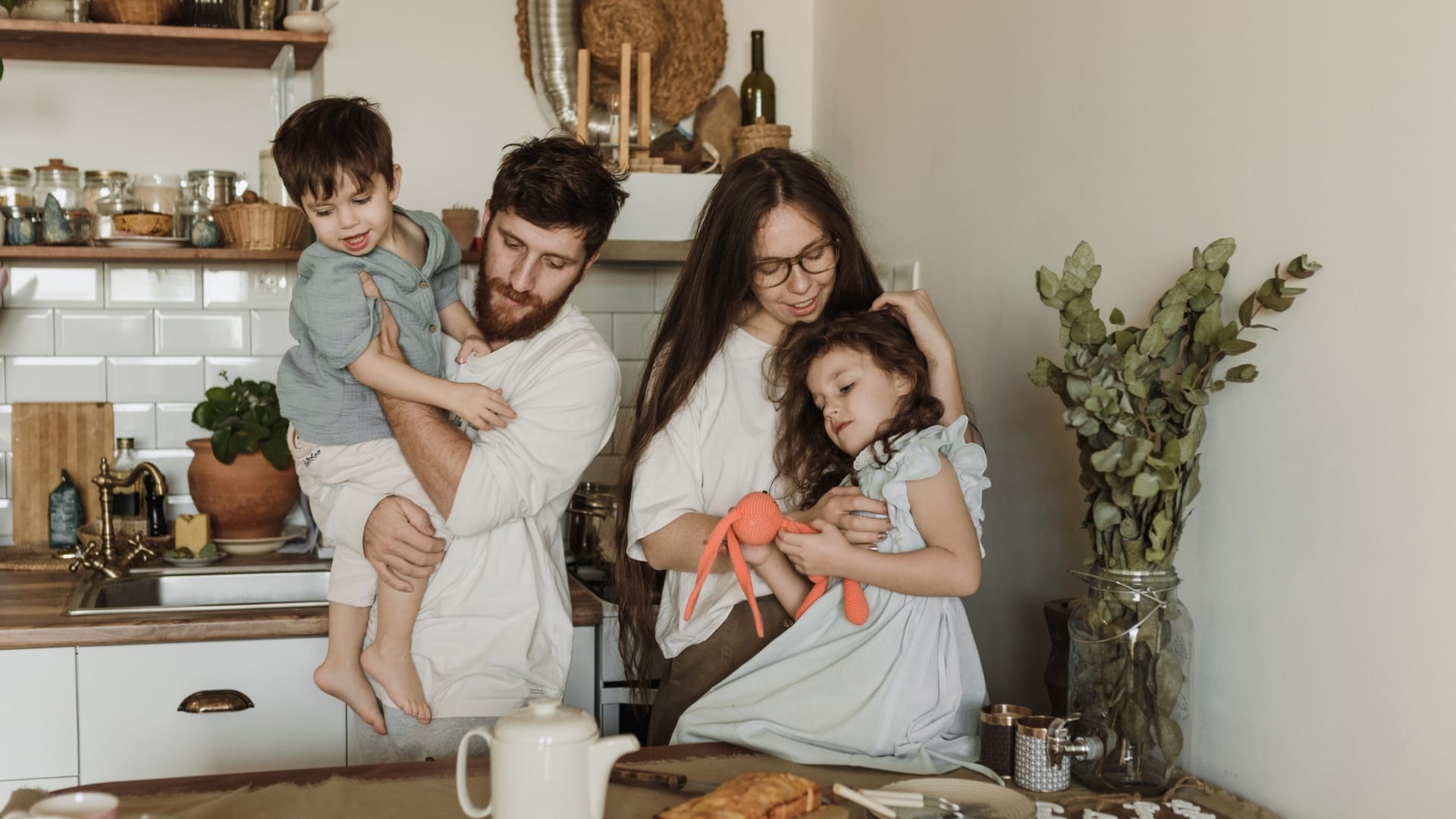 When Does Buying vs. Renting a Home Make More Sense a family in the kitchen talking about When Does Buying vs. Renting a Home Make More Sense?