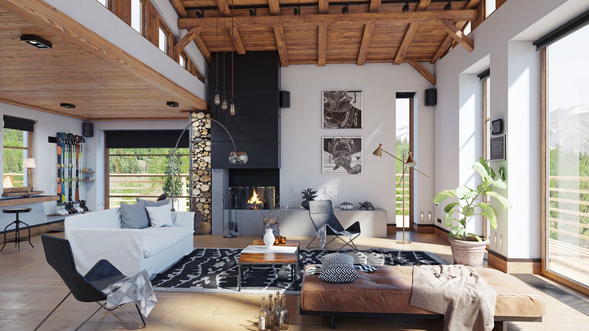 Bright and spacious vacation home interior with exposed wood beam ceilings, a stone fireplace, and floor-to-ceiling windows overlooking a mountain landscape
