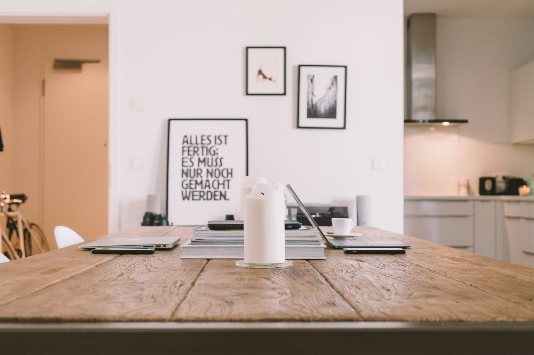 A candle on a dining room table