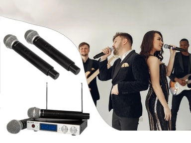 A man and a woman singing into microphones