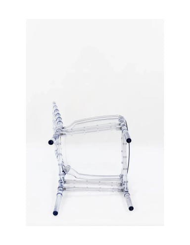 A clear plastic chair with black wheels on a white background