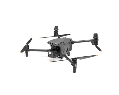 A black and gray remote controlled flying device