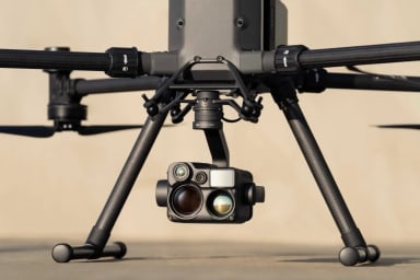 A close up of a camera on a tripod