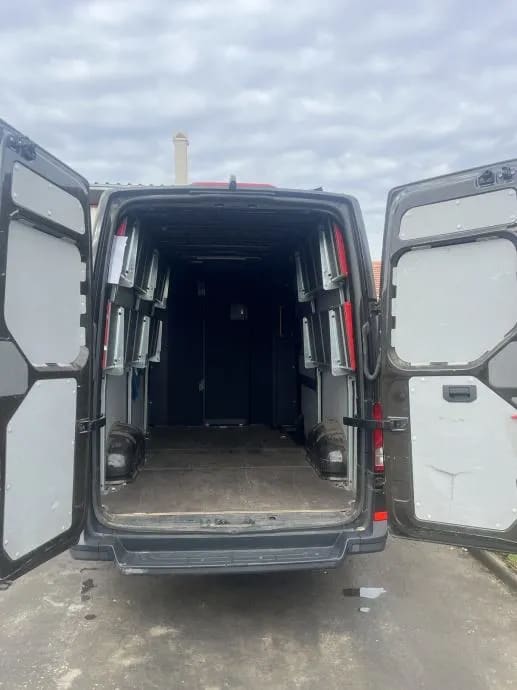 The back of a van with its doors open