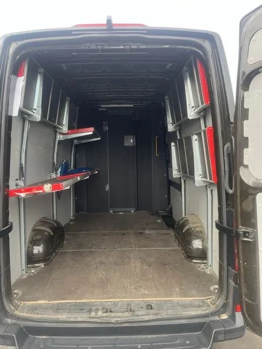 The back of a van with its doors open