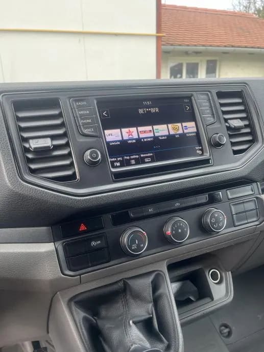 The dashboard of a car with a large screen