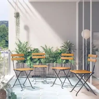 A group of chairs sitting on top of a balcony