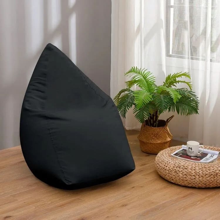 A bean bag chair sitting on top of a wooden table