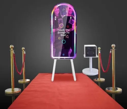 A display of a cell phone on a red carpet