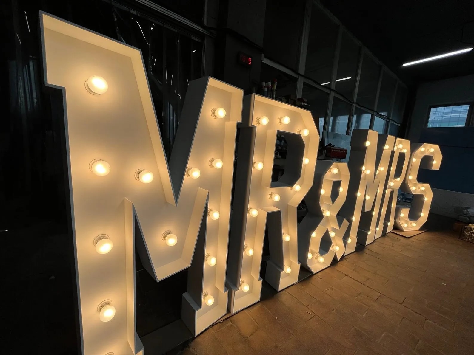 A large marquee sign that says mr and mrs