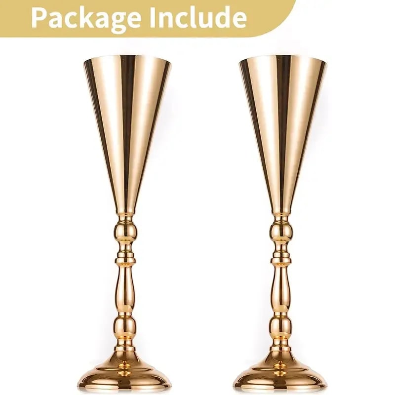 A pair of gold candlesticks sitting on top of each other