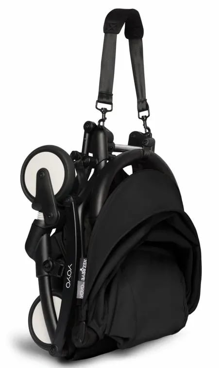 A close up of a black bag on a white background