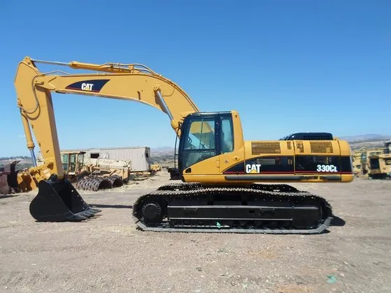 A bulldozer sits in the middle of a construction site
