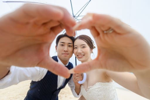 最後は手をハートに