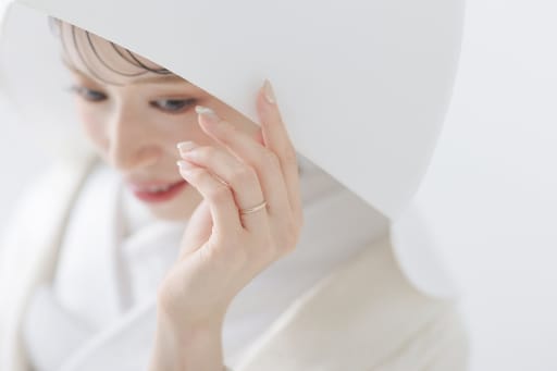 綿帽子姿の新婦様は、まさに和の花嫁そのもの。やさしく凛とした表情がとても印象的でした。