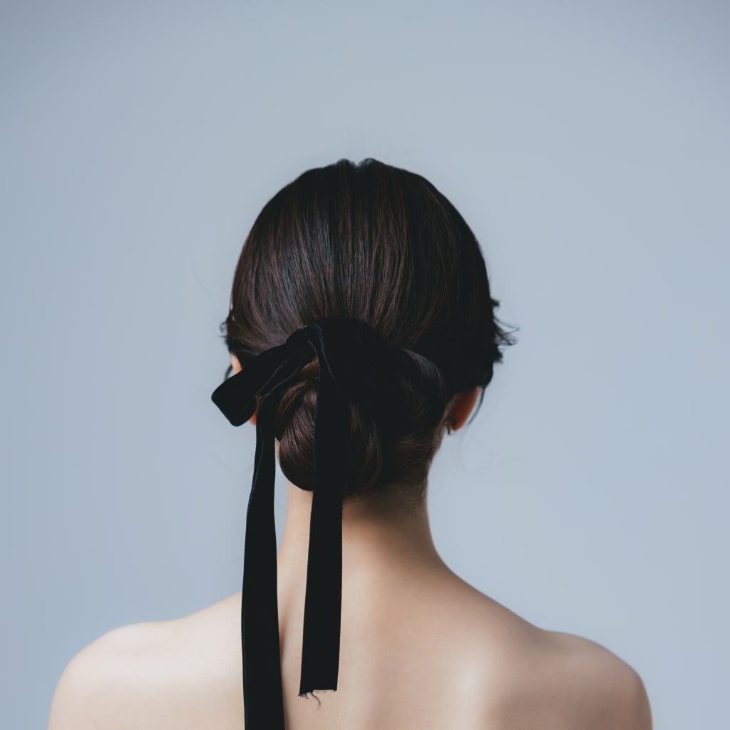 タイトシニヨンヘア