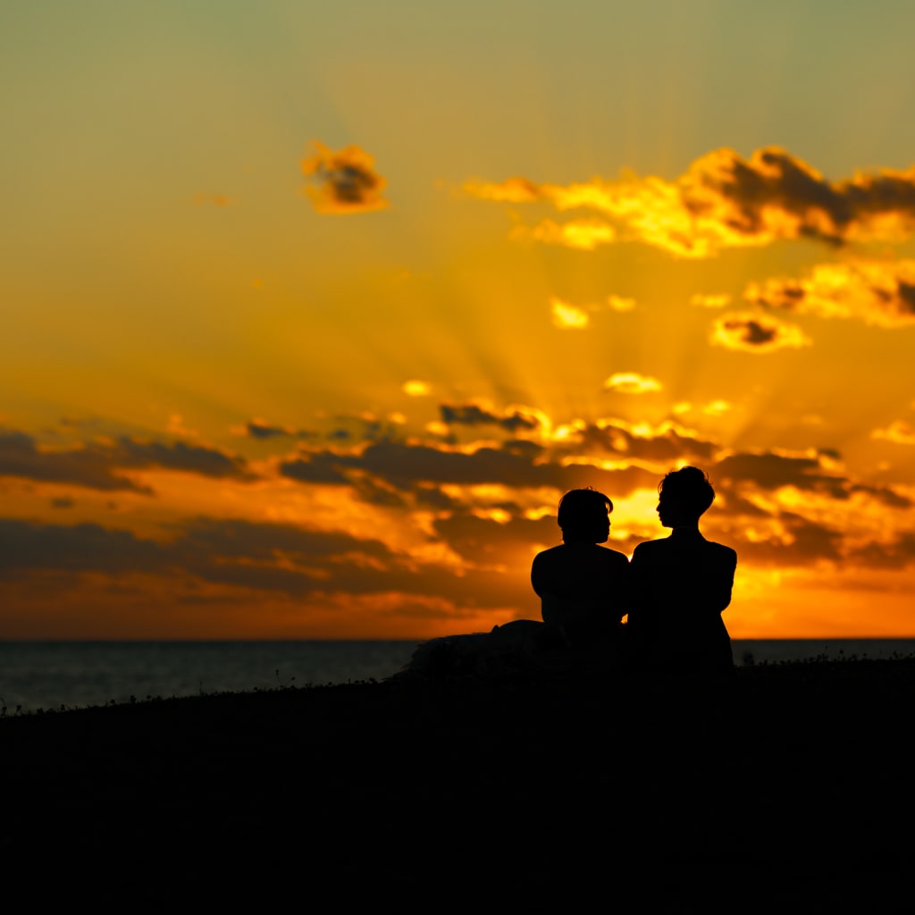 瀬底ビーチ_夕日撮影 | デコルテフォトグラフィー | 前撮り・フォトウェディング