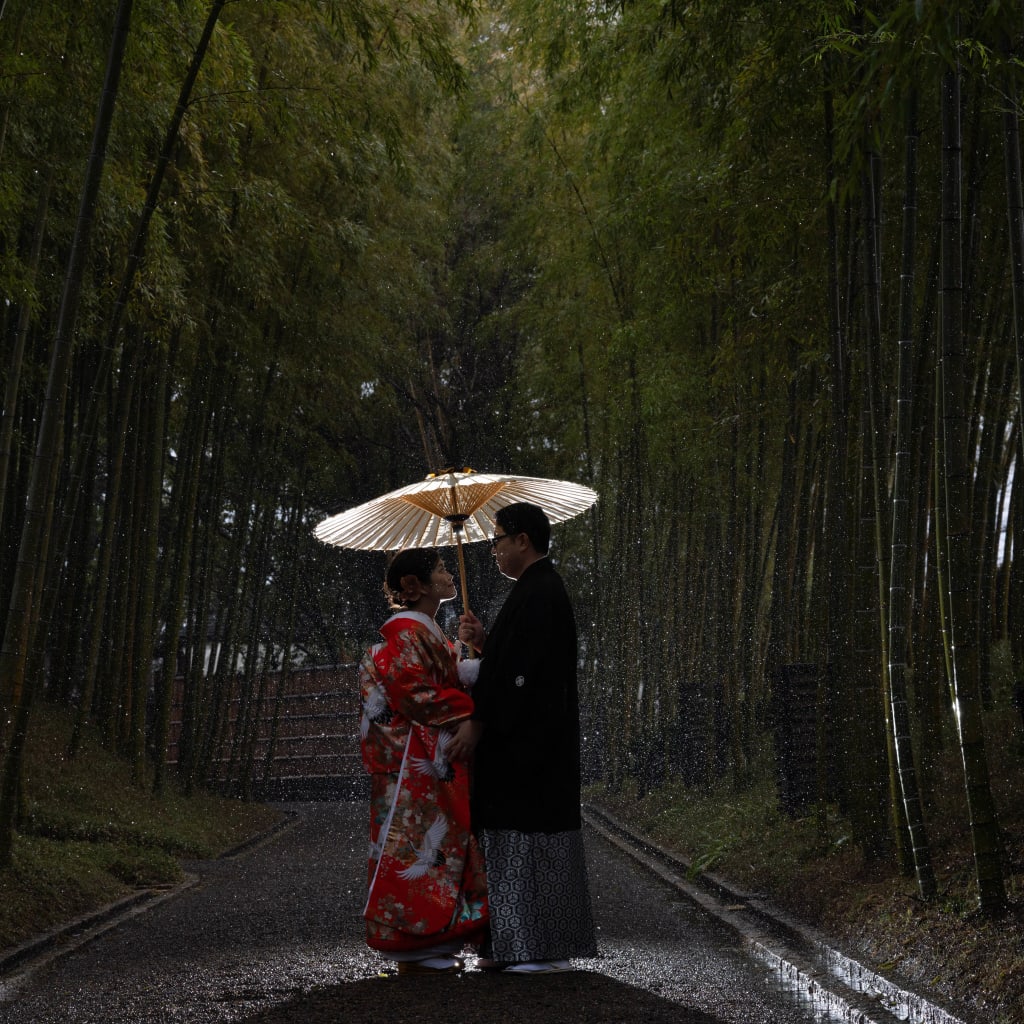 雨でも笑顔な二人