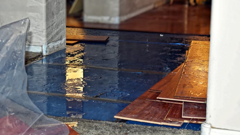 A damaged floor caused by a slab leak.