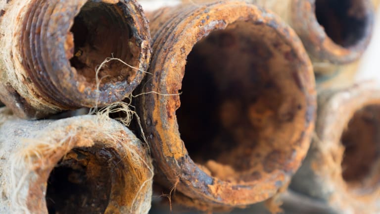 A collection of old rusty galvanized pipes
