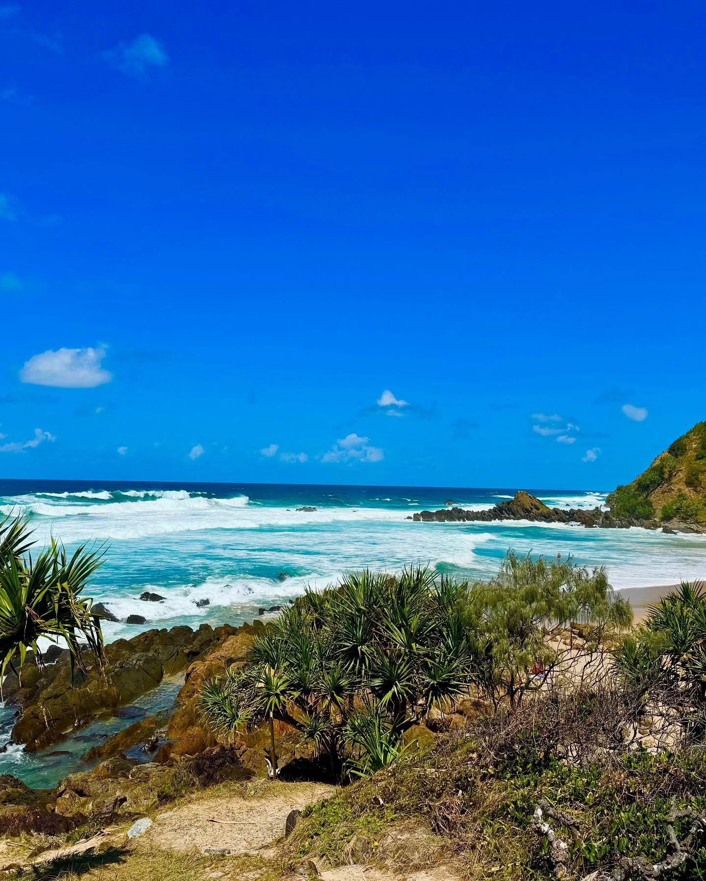 Wake up with the sun in Byron Bay 🌅—where lush rainforests meet crystal-clear waves and the day starts with a surf and a smile."