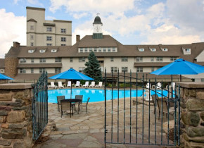 Outdoor pool at The Inn at Pocono Manor.