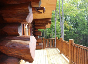 Cabin porch at Aqua Log Cabin Resort.