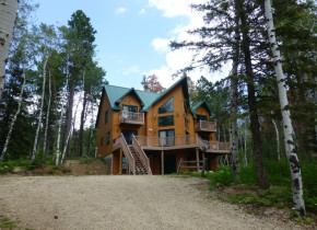 Cabin exterior at Deadwood Connections.