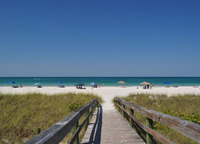 Boardwalk to beach at Lizzie Lu's Island Retreat.