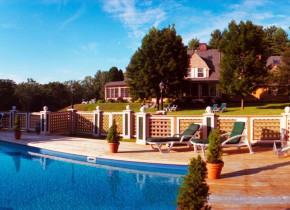 Outdoor pool at Inn At Lake Joseph.