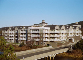 Exterior view of Rivertide Suites Hotel.