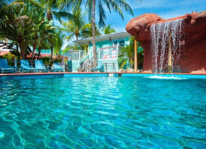 Outdoor pool at Lighthouse Resort Inn & Suites.