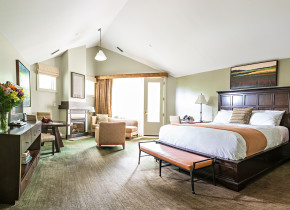 Guest suite with fireplace at Emerson Resort & Spa.