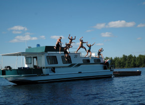 Jumping into the lake at Rainy Lake Houseboats.