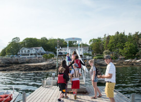 Family on dock at Linekin Bay Resort.
