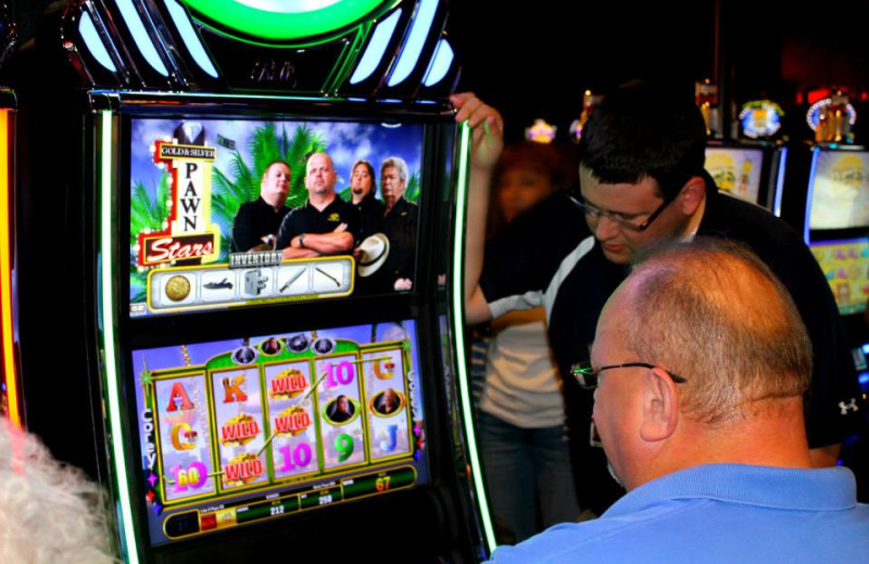 Playing the slot machine at Rocky Gap Casino Resort.