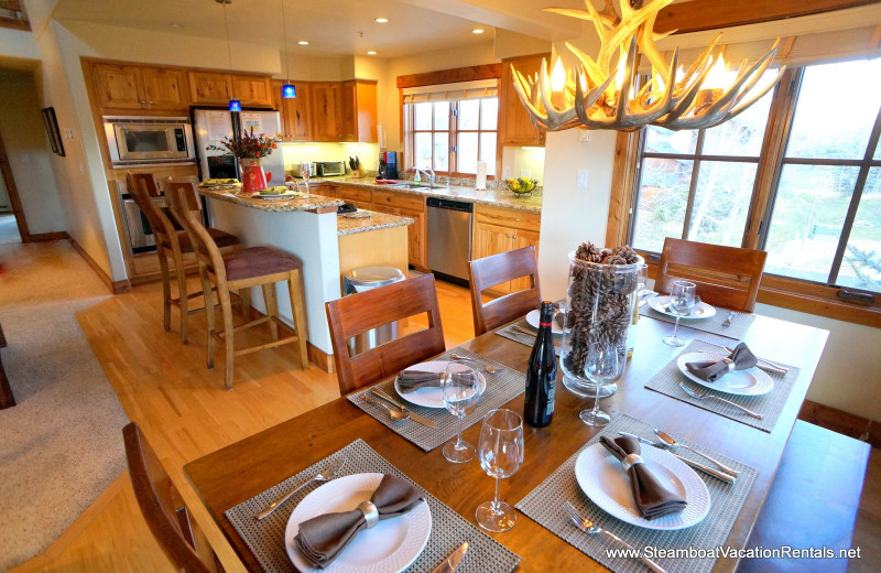 Rental kitchen and dining at Steamboat Vacation Rentals.