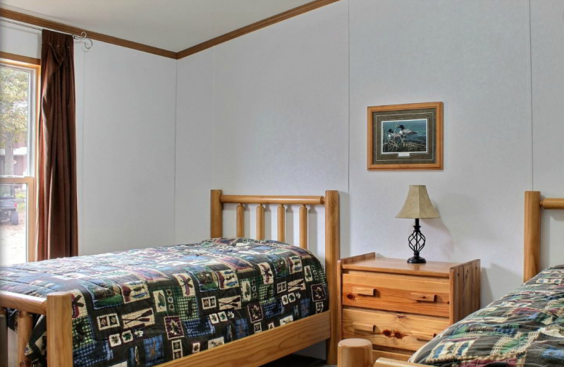 Cabin bedroom at Whaley's Resort & Campground.